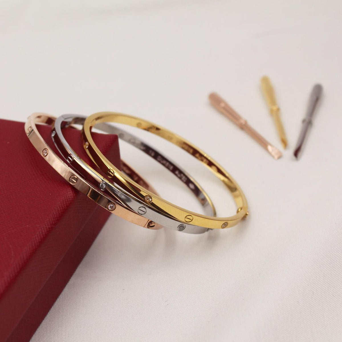 Cartier LOVE Small Model Bracelets with Diamonds in Rose Gold, White Gold and Yellow Gold