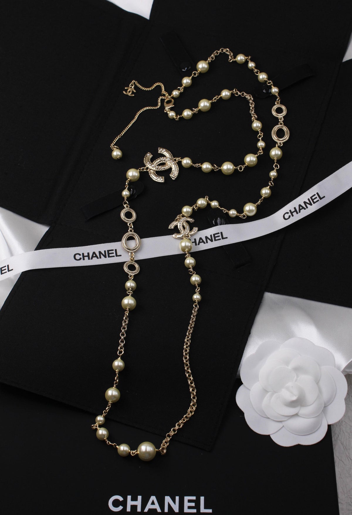 Chanel Long Pearl Necklace with CC Logo