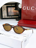 Gucci Oval Horsebit Sunglasses