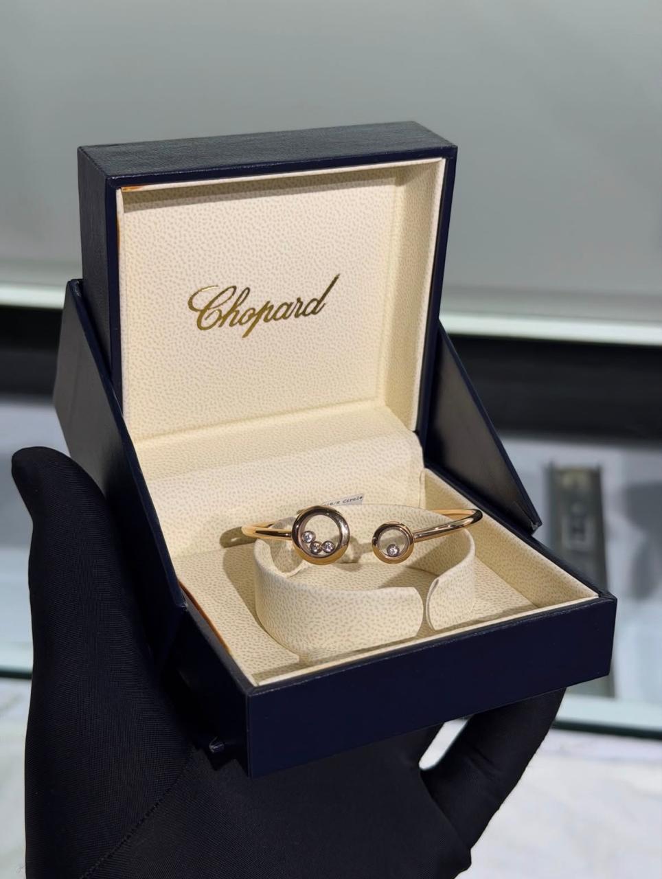 Chopard Happy Diamonds Open Cuff Bracelet — -Tone Metal with Asymmetric Round Motifs and Floating Stone Details.