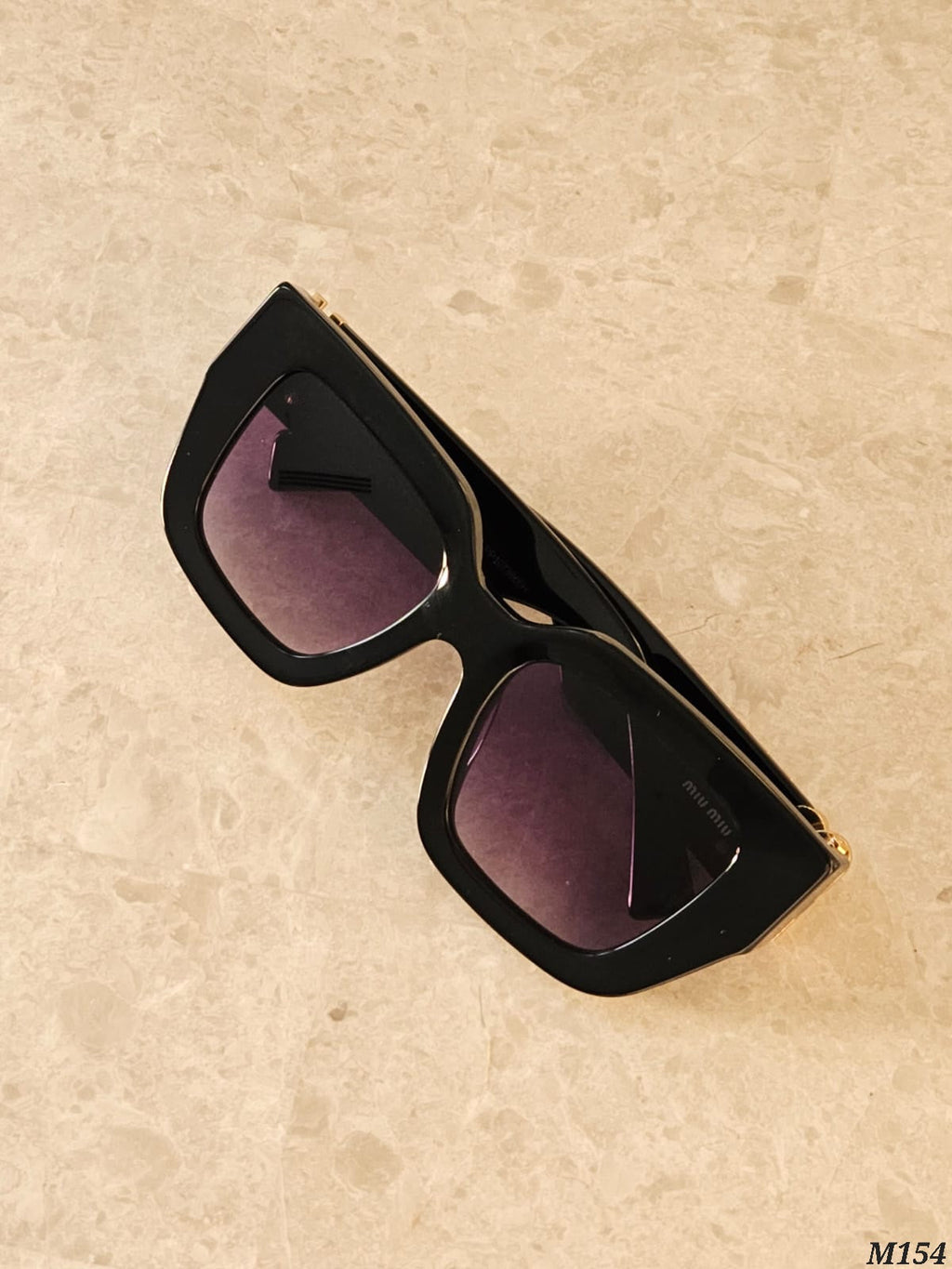Miu Miu Bold Logo Cat Eye Sunglasses