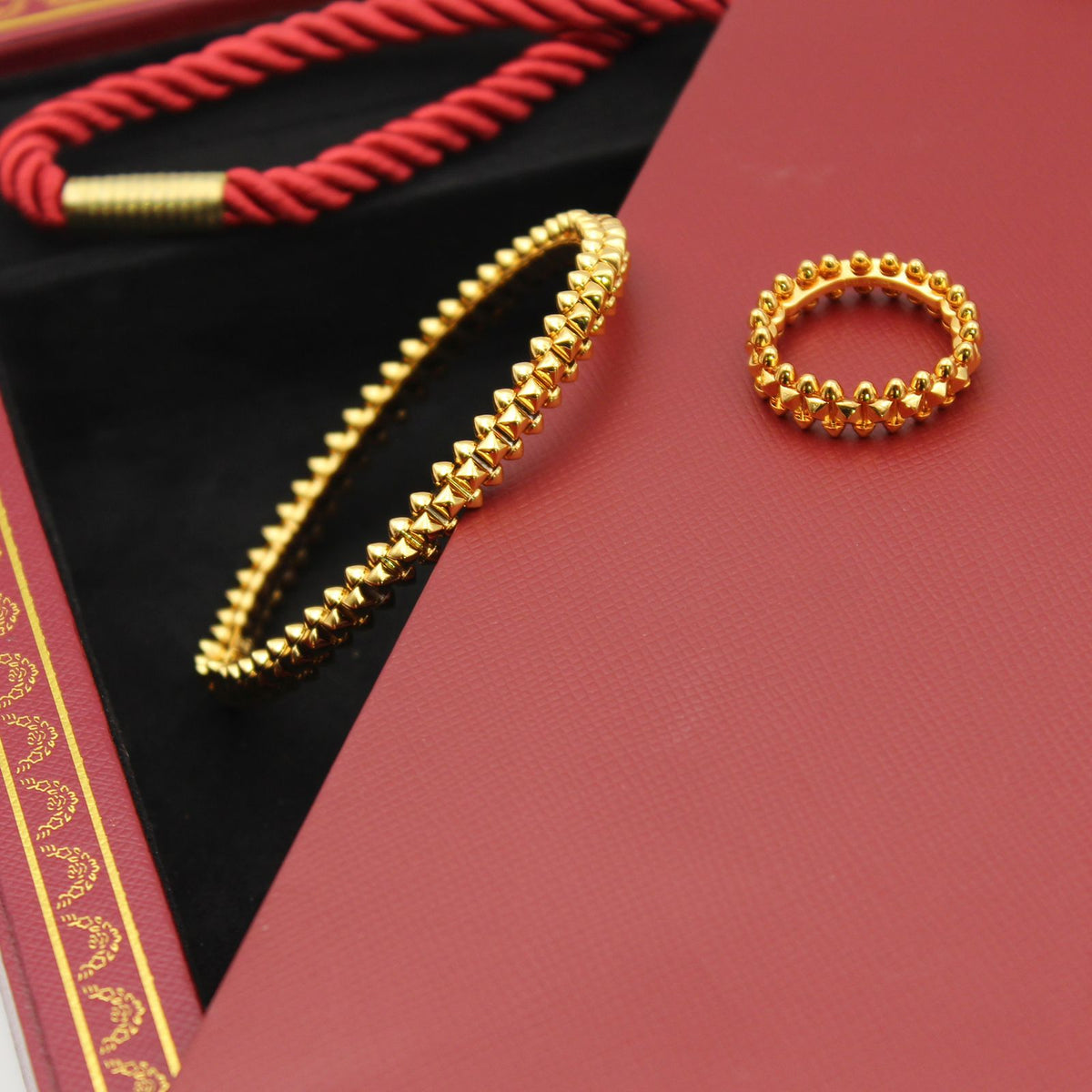 Cartier Gold Tone Clash Bracelet and Ring Set