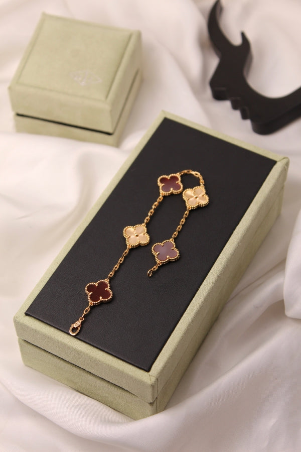 VAN CLEEF Alternating Clover and Sculpted Flower Bracelet