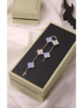 VAN CLEEF Alternating Clover and Sculpted Flower Bracelet